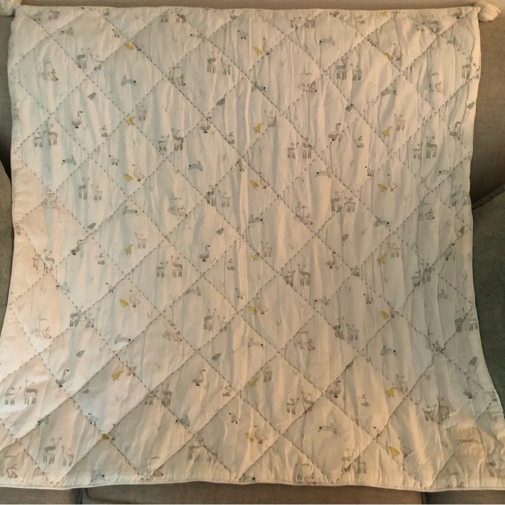 Quilted Baby Blanket in Soft Cream with Animal Motif
